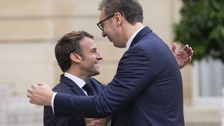 French President Emmanuel Macron, left, welcomes Serbian President Aleksandar Vucic before their talks Thursday, Nov. 10, 2022 at the Elysee Palace in Paris. 