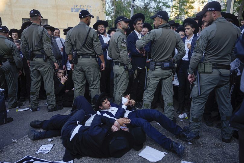 Ultra-Orthodox Jewish men protest against army recruitment in Jerusalem