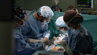 Dr. Daniel Pereda (left), ​​during the robotic heart surgery at Hospital Clinic, Barcelona 8 April 2024.