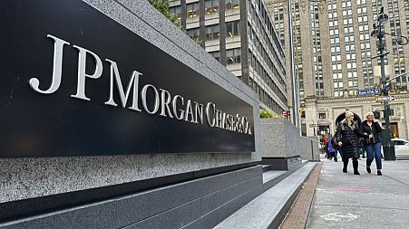 Pedestrians approach JPMorgan Chase headquarters on Dec. 29, 2023, in New York. JP Morgan reports earnings on Friday, April 12, 2024.