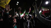 Iranian demonstrators chant slogans during an anti-Israeli gathering in front of the British Embassy in Tehran, Iran, early Sunday, April 14, 2024.