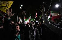 Iranian demonstrators chant slogans during an anti-Israeli gathering in front of the British Embassy in Tehran, Iran, early Sunday, April 14, 2024.
