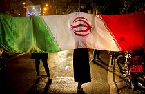 Иранцы с национальным флагом