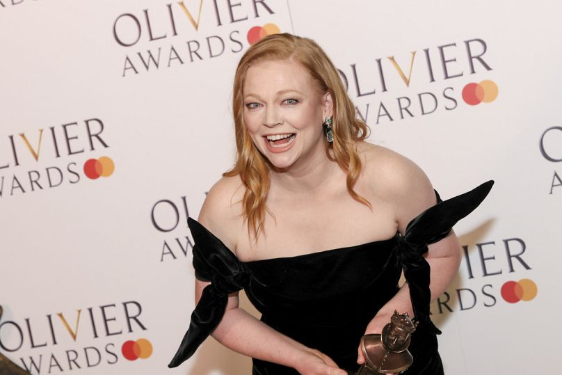 Sarah Snook, winner of the best actress award for "The Picture Of Dorian Gray", poses for photographers in the winner's room during the Olivier Awards on 14 April 2024