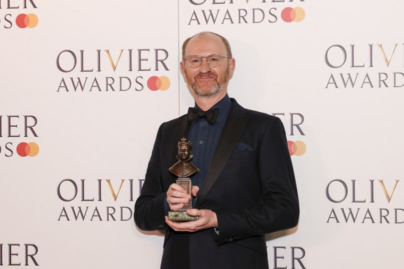 Mark Gatiss, winner of the best actor award for "The Motive and The Cue", poses for photographers in the winner's room during the Olivier Awards on Sunday, 14 April 2024