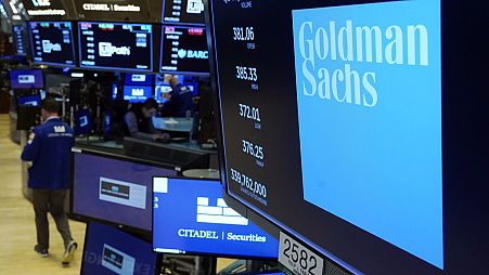 The logo for Goldman Sachs appears above a trading post on the floor of the New York Stock Exchange, Tuesday, July 13, 2021.