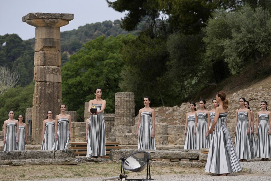 The flame will be carried through Greece for 11 days before being handed over to Paris organizers on April 26.