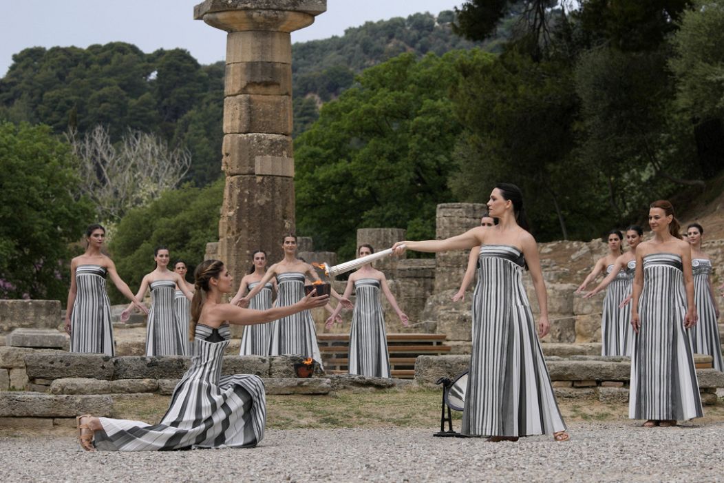 Performers take part in the official ceremony of the flame lighting for the Paris Olympics, at the Ancient Olympia site, Greece.