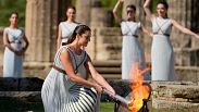 Lighting the Olympic flame at the birthplace of the ancient Olympics in southwestern Greece.