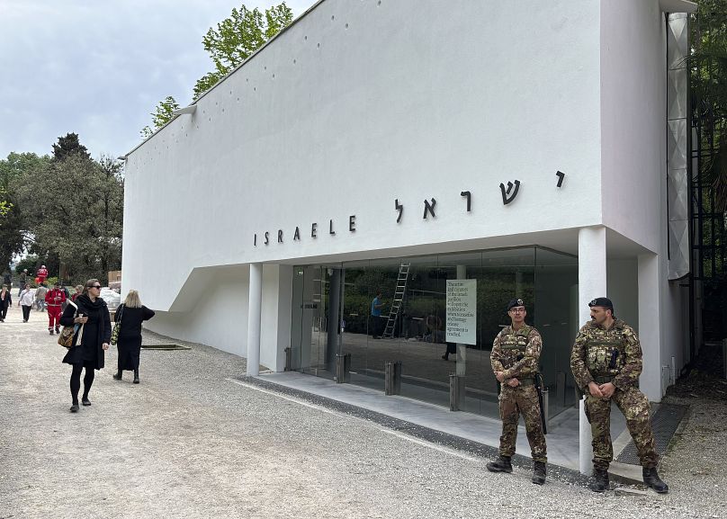 Italian soldiers patrol the Israeli national pavilion at the Biennale contemporary art fair in Venice, Italy, Tuesday, April 16, 2024