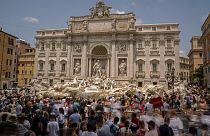 Tourists visit the Trevi Fountain in Rome, on June 30, 2023. 