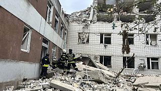 In this photo provided by the Ukrainian Emergency Service, rescuers work at the site of a Russian missile strike in Chernihiv, Ukraine, Wednesday, April 17, 2024.