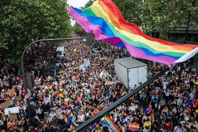 Crowds attend the annual Gay Pride march in Paris in 2021