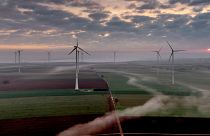 Wind turbines operate at an energy plant near Stetten, north of Kaiserslautern, Germany. 