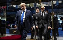 Republican presidential candidate Donald Trump arrives with Poland's President Andrzej Duda at Trump Tower in New York, Wednesday, April 17, 2024.