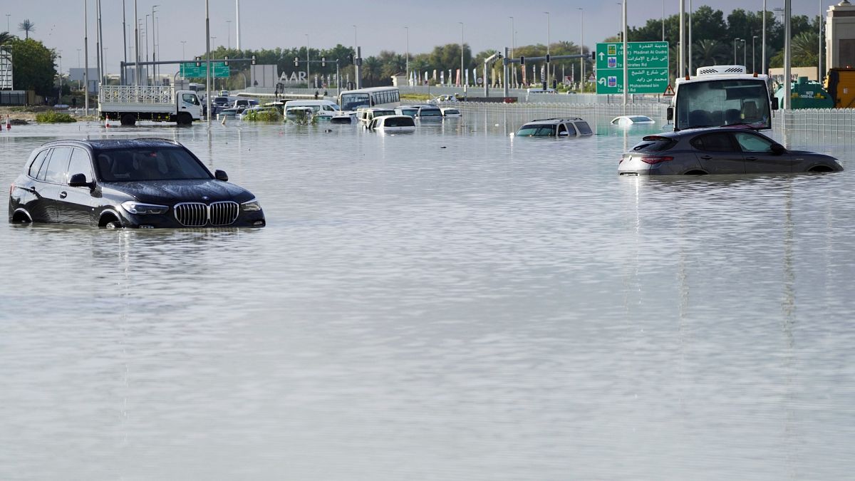What causes heavy rains in Dubai?