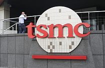 A person walks into the Taiwan Semiconductor Manufacturing Co., Ltd. (TSMC) headquarters in Hsinchu, Taiwan on Oct. 20, 2021. 