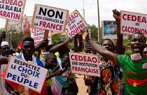 Supporters of military leader Ibrahim Traore protest against France and the West African regional bloc known as ECOWAS in the streets of Ouagadougou, Burkina Faso.