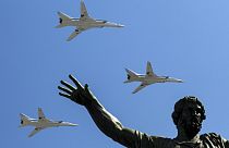 FILE - Russian Tu-22M-3 long-range bombers fly during the Victory Day military parade marking 71 years after the victory in WWII in Red Square in Moscow, Russia, 2016.