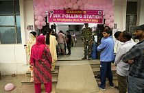 People wait in a queue at a Pink Polling Station, where all the polling officials are women, to cast their vote during the first round of polling of India's national election 