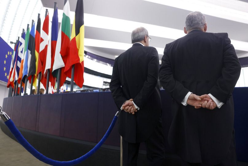 Ushers stand at the European Parliament in Strasbourg, January 2023