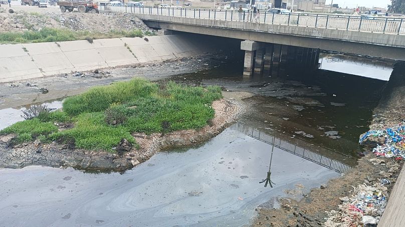 Oil slicks in the Khabur River, a major tributary of the Euphrates.