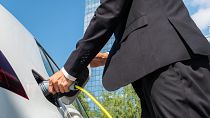 Electric car leasing plans are part of the "green perks" being offered by some companies to employees.