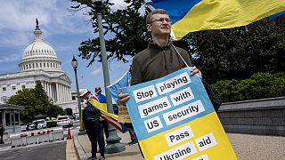 Activists supporting Ukraine demonstrate outside the Capitol in Washington, Saturday, April 20, 2024, 