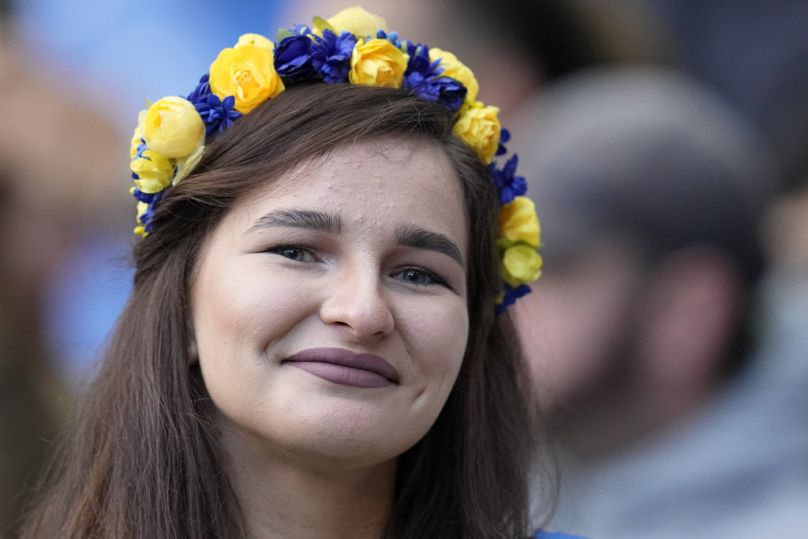 A fan in the stands ahead of the Game4Ukraine charity soccer match at Stamford Bridge stadium in London, August 2023