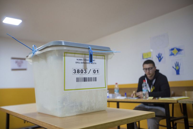Few casted ballots seen inside the ballot box at a empty polling station in the northern Serb-dominated part of ethnically divided town of Mitrovica, Kosovo, Sunday, April 21,