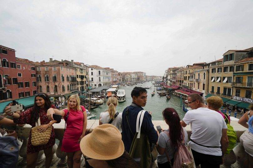 Visitantes en Venecia.