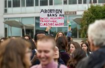 People stage a protest on 'International Safe Abortion Day', Milan, Wednesday, Sept. 28, 2022. 
