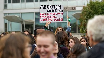 People stage a protest on 'International Safe Abortion Day', Milan, Wednesday, Sept. 28, 2022. 