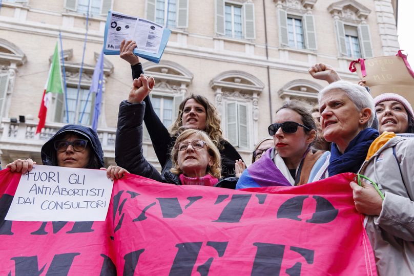 FILE - Women protest in front of the Italian Senate in Rome, Monday, April 22, 2024.