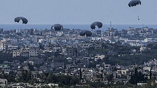 Israel-Hamas war: Humanitarian aid parachuted into northern Gaza