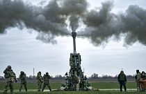 FILE - Ukrainian soldiers fire at Russian positions from a US-supplied M777 howitzer in Kherson region, Ukraine, 9 January, 2023.