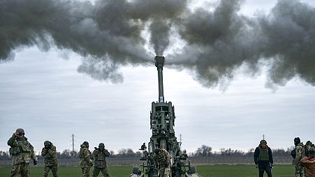 FILE - Ukrainian soldiers fire at Russian positions from a US-supplied M777 howitzer in Kherson region, Ukraine, 9 January, 2023.