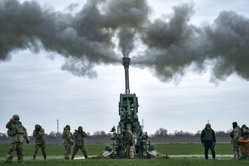 FILE - Ukrainian forces fire artillery in southeastern Ukraine.