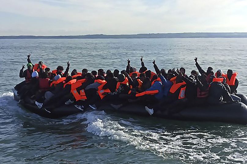 This photo provided by the Prefecture Maritime du Nord et de la Manche shows migrants continuing their journey to Britain off northern France coast, Tuesday, April 23, 2024