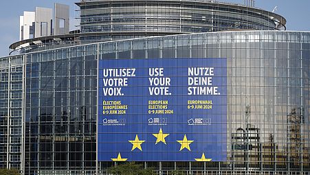 A giant canvas promoting the European elections is seen on the European Parliament Thursday, April 11, 2024 in Strasbourg, eastern France. 