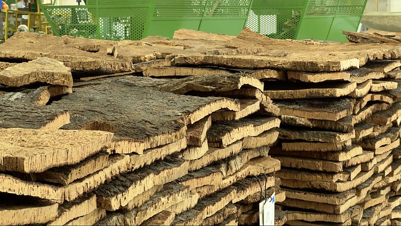 Piles of cork bark in one of Amorim's cork factories in Santa Maria de Lamas.