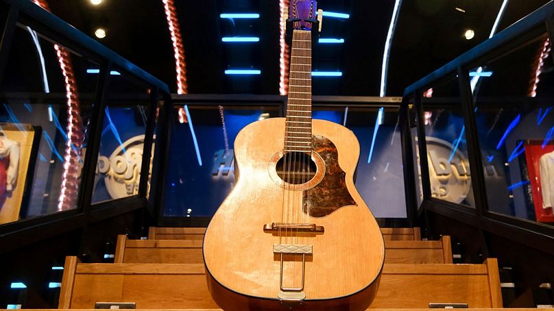 Lennon's lost guitar on display in London ahead of the auction