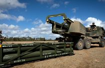 FILE PHOTO - In this image provided by the U.S. Army, Army Tactical Missile System (ATACMS) on to the High Mobility Artillery Rocket System (HIMARS) in Queensland, Australia.