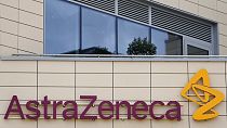 In this Saturday, July 18, 2020 file photo a general view of AstraZeneca offices and the corporate logo in Cambridge, England.