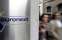 People walk past the Euronext headquarters in Paris (file photo)