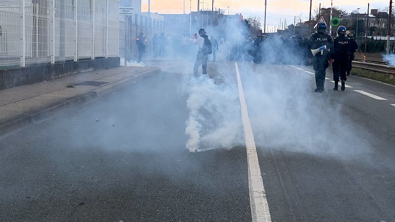 Police fired tear gas at climate activists to break up the different groups.