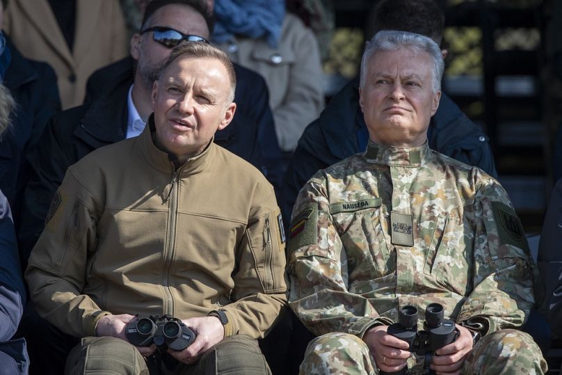 Poland's President Andrej Duda, left, and Lithuania's President Gitanas Nauseda watch a Lithuanian-Polish Brave Griffin 24/II military exercise. Friday, April 26, 2024.