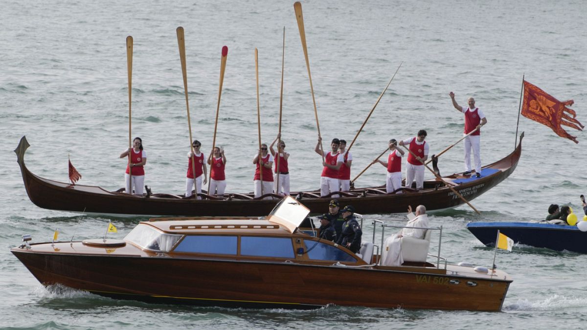 Pope Francis is greeted by Gondoliers upon his arrival in Venice, Italy