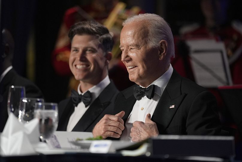 President Joe Biden, right, and host Colin Jost attend the White House Correspondents' Association Dinner at the Washington Hilton, Saturday, April 27, 2024, in Washington..