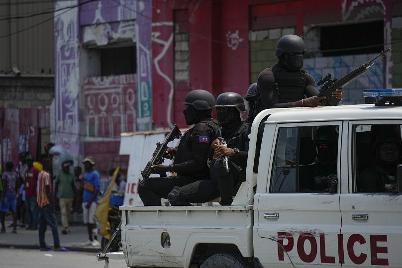 Police patrol the Champ de Mars area of Port-au-Prince, Haiti, Wednesday, April 24, 2024